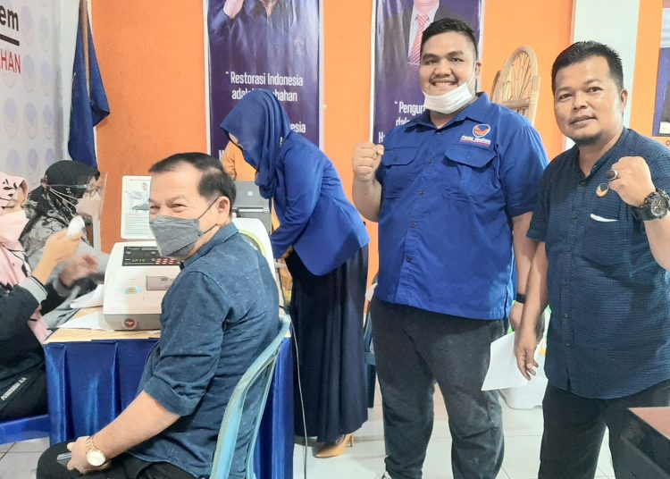 Kegiatan vaksinasi Covid-19 tahap kedua di DPD Nasdem Kota Padang, Sabtu (18/9/2021)