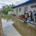 Pelepasan bibit ikan nila di sungai Kampung Dalam Pauh Kota Padang.