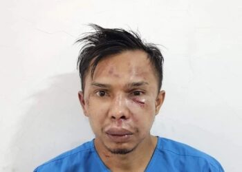 Indra Septiarman tersangka kasus pembunuhan Nia Kurnia Sari mengenakan baju tahanan.