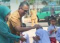 Sosialisasi Pekan Imunisasi Nasional (PIN) Polio yang dihadiri oleh Pjs Wali Kota Bukittinggi, Hani Syopiar Rustam serta Pjs TP PKK Kota Bukittinggi, Ny Merry Hani Rustam, di SD Negeri 03 Pakan Kurai