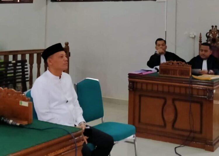 Sabar AS menjalani sidang perdana di Pengadilan Negeri (PN) Lubuk Sikaping pada Jumat (13/12/2024).