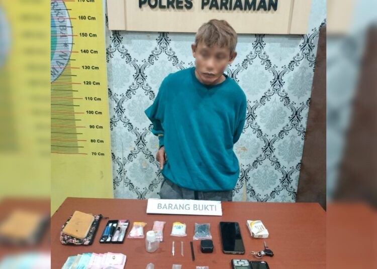 Polisi menangkap pria berinisial SA (46) di halte depan SMKN 1 Air Santok, Kecamatan Pariaman Timur, Kota Pariaman, Sumatera Barat, pada Minggu (19/7/2026) sekitar pukul 16.30 WIB. Foto: Polres Pariaman