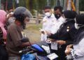 Lindungi Warga dari Kabut Asap, Pemkab Dharmasraya Bagikan Ribuan Masker
