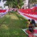 Selalu Bawa 2 Anak Berjualan, Pedagang Bendera di Padang Bertahan di Tengah Sepinya Pembeli