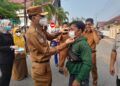 Bank Nagari Salurkan 16 Ribu Masker untuk ASN dan Warga Pesisir Selatan