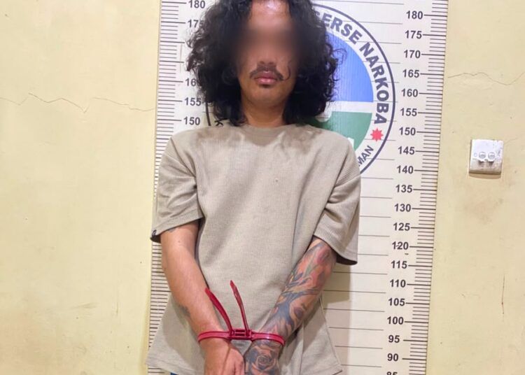 EGA (25), anak kandung yang dilaporkan orang tua ke polisi menjadi tersangka kasus narkoba.